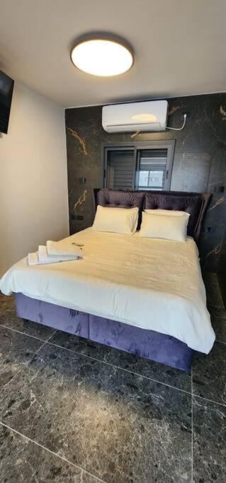 מבנים בים 75 Suites At Sea Haifa Bagian luar foto